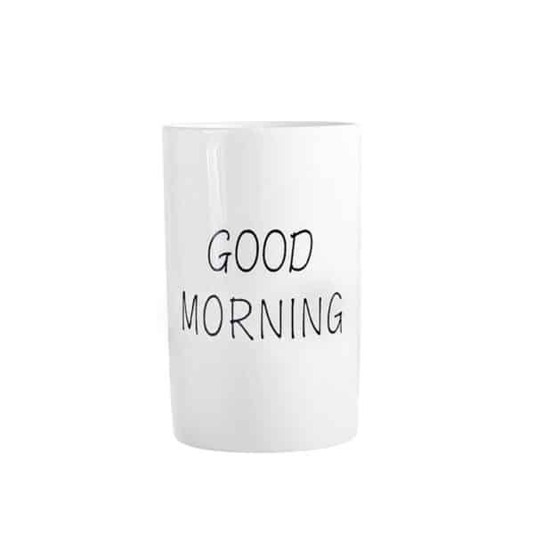 white ceramic tumbler