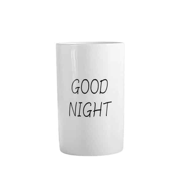white ceramic tumbler