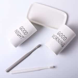 white ceramic tumbler